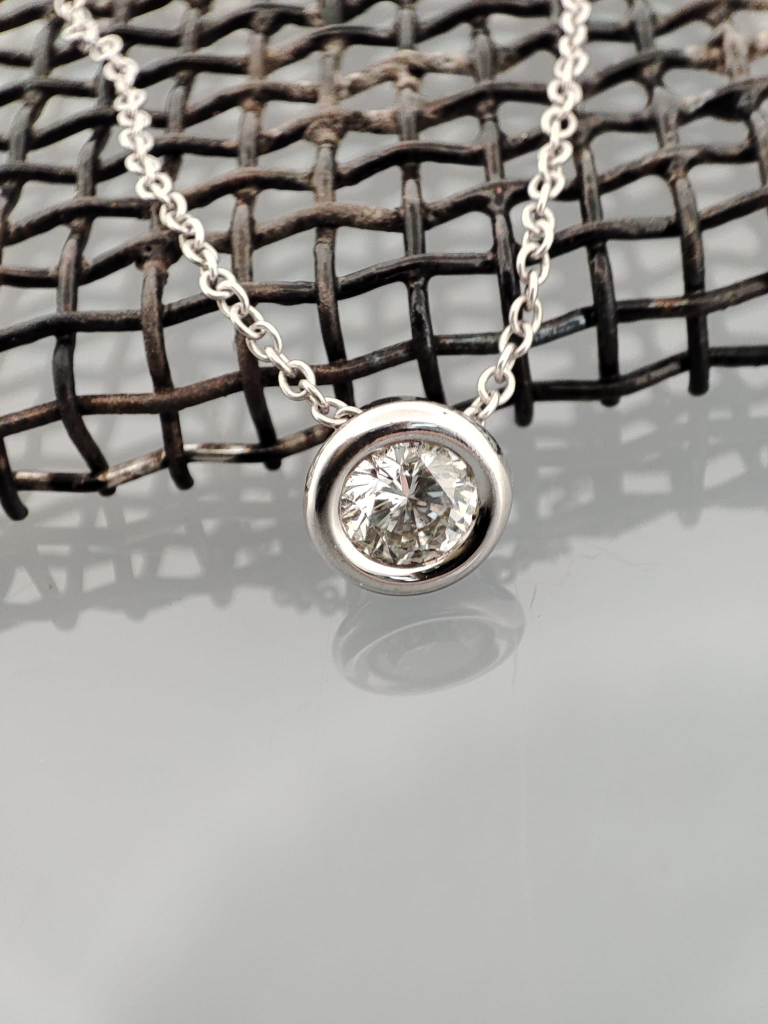 Recup wirgouden collier met 0,50ct diamant